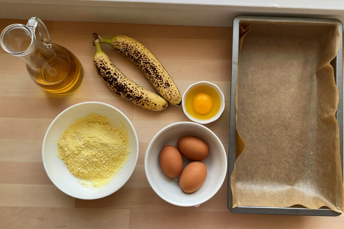 Ingredients for banana bread using cake mix: yellow cake mix, ripe bananas, eggs and oil